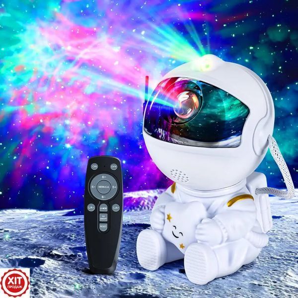Лазерний нічник-проектор зоряного неба Космонавт, від USB, з пультом / Дитячий світильник з проекцією космосу 0234568377 фото